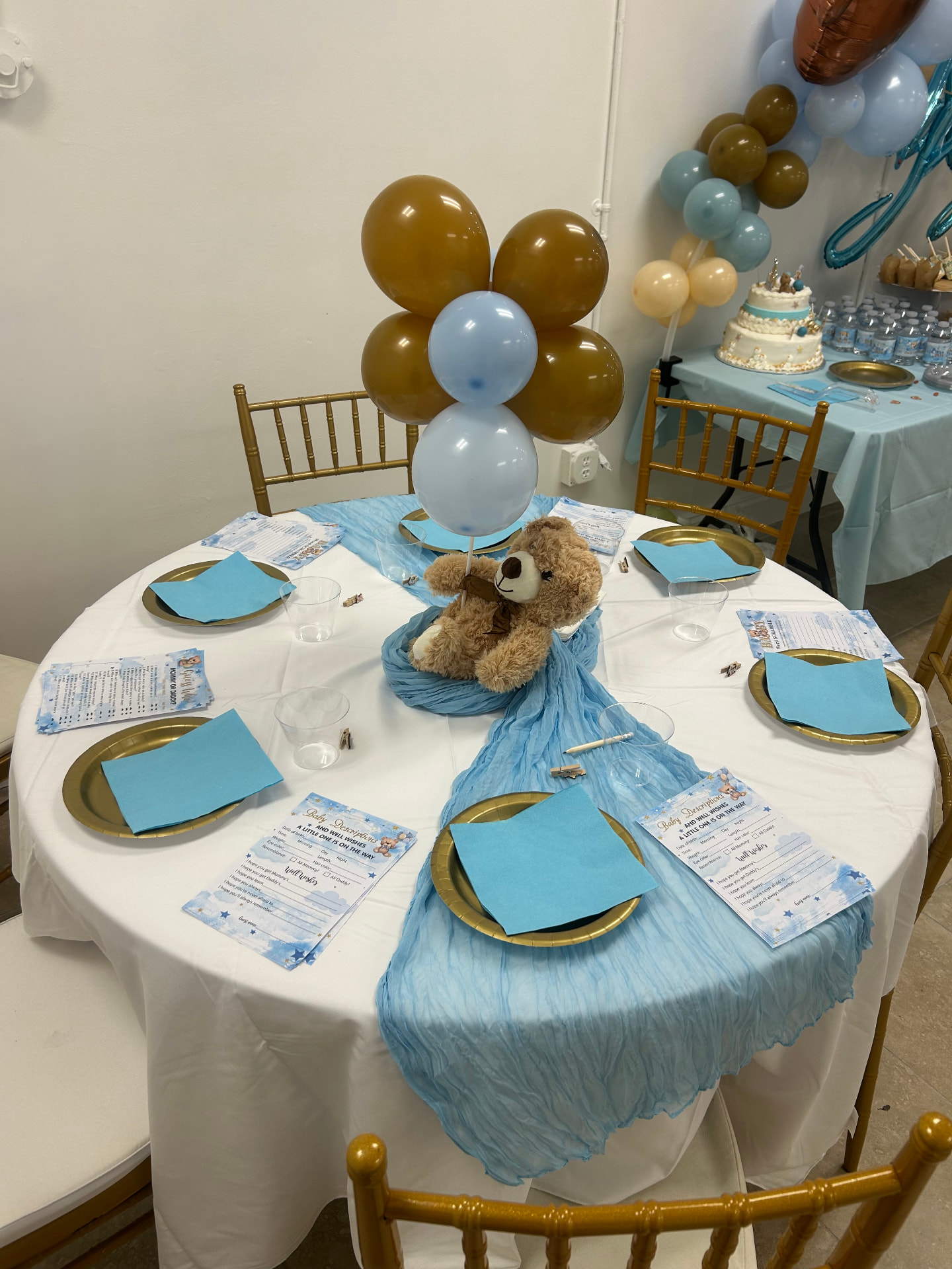 Blue and gold teddy bear party tablescape
